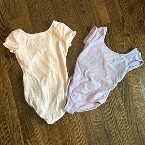 Two leotards. No size tag. About a 4/5T